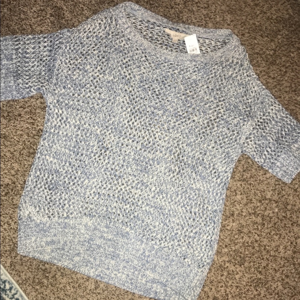 Light Blue Sweater.